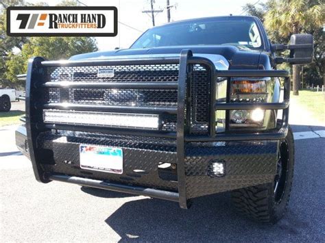 The built in grille guard provides maximum protection to the headlights and all around unyielding front end protection. . Led fog lights for ranch hand bumper